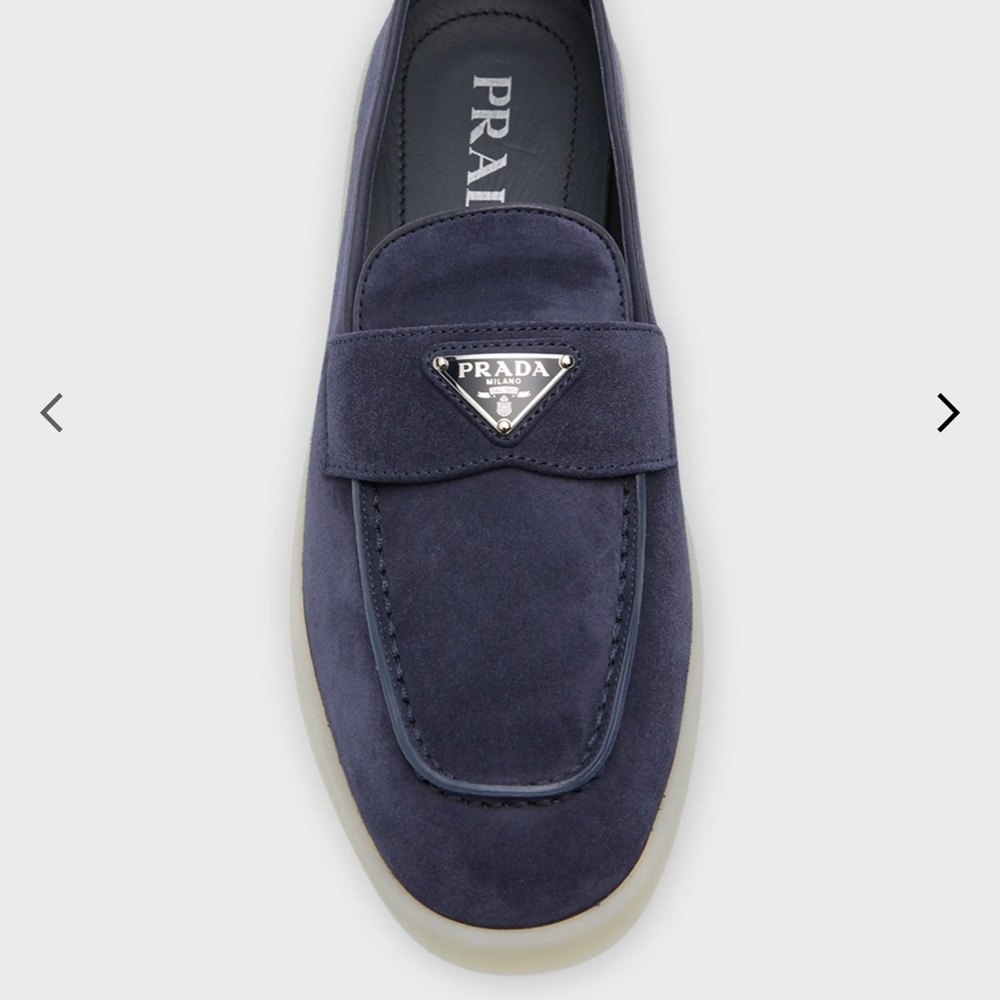 Prada women’s Deep Blue Slip-On Loafers